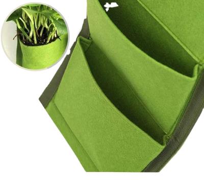 China Eco-friendly Green Color Reusable Black Planter Root Plant Bag Held Hanging Grow Bag Vertical Garden Wall Grow Bags for sale