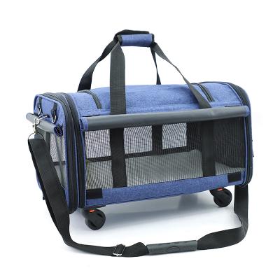 China 2021 Viable Wholesale Pet Carrier Travel Wheel Pet Carrier for Dogs and Cats Universal Dog Carrier for sale