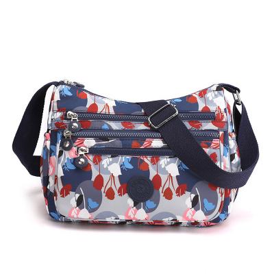 China 2022 New Large Capacity Multi Layer Messenger Bags Ladies Nylon Canvas Multi Layer Women Bags for sale