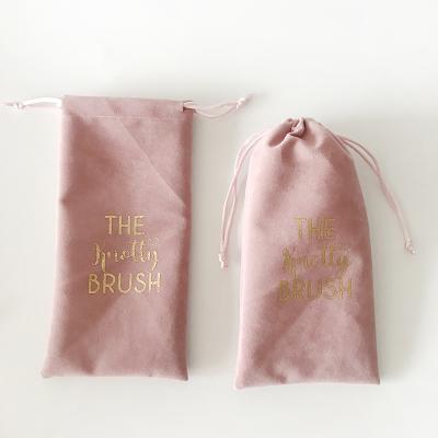 China Recyclable Custom Printed Gold Logo 10x20cm Drawstring Velvet Comb Pink Packaging Bags for sale