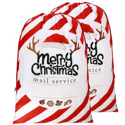 China Recyclable Personalized Stripe Print Cotton Drawstring Christmas Gift Bags Large Canvas Bags For Decorations for sale