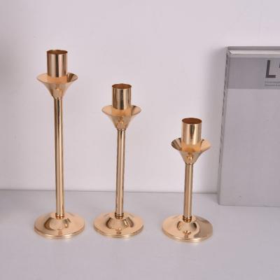 China New antique imitation high gold metal candle holder stick for sale