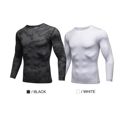 China Breathable In Quick-Drying Gym T-shirt Stock Men's Workout Outdoor Sports Running Tight Breathable Tight Tops Long Sleeve Stretch Tights Ts for sale