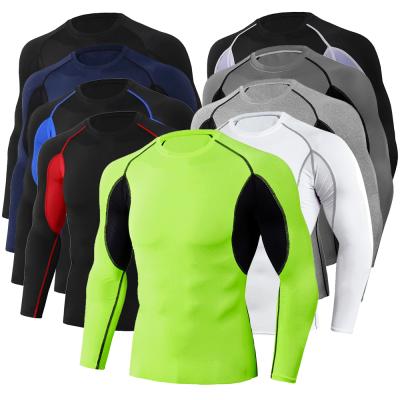 China Men's Fitness Shirt Gym Sportswear Long Sleeve Jogging Compressed Running T-Shirt Breathable Tight Sports T-Shirt Quick-Drying Compressed Running T-Shirt for sale