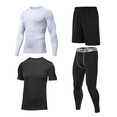 China Wholesale Customized Men's Breathable Sportswear Casual 4 Piece Compression Set Jogger Fitness Sports Bottoming Long SL Pants and Shorts for sale