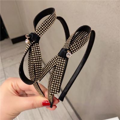 China Wholesale New Arrivals Faux Gold High Tension Plastic Rivet Gold Thin Bow Elastic Hairband Glitter Bling Hairband Elastic Headband for sale