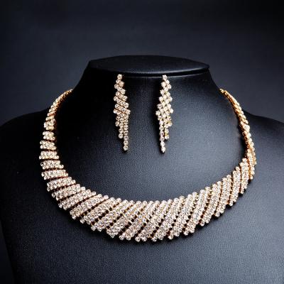 China Hot Sale FASHIONABLE Crystal Rhinestone 18k Gold Plated Necklace Earrings Jewelry Set For Women Girls Bridal Wedding for sale