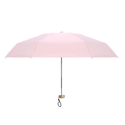 China Gold Flat Handle MINI Sunblock Black Modern 5 Fold UV Coating Compact Umbrella for sale