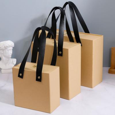 China Recycled Materials Wholesale Price Cheap Kraft Paper Shopping Gift Paper Bag For Packaging for sale