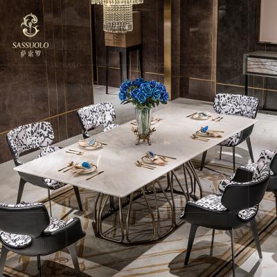 China Newest Design Luxury Sassuolo Marble Dining Table 304 Stainless Steel Metal Place Wedding Table Sets Economic Apartment Dining Sets for sale