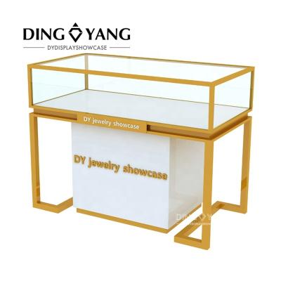 China Factory Supply Luxury Classy Modern Brush Stainless Steel Gold Jewelry Shop Display Stand With Lights Locks for sale