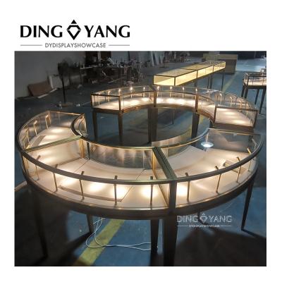 China Luxury Factory Wholesale Modern Gold Curve Around Glass Jewelry Cabinets With Preassembly Structure For Boat for sale