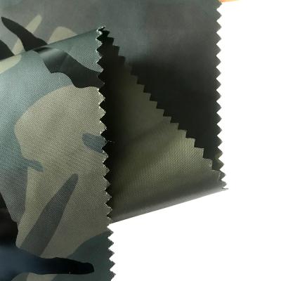 China Waterproof 100% Polyester Taffeta Fabric Camouflage Transfer Printed Film Tan Cired Black Back for sale