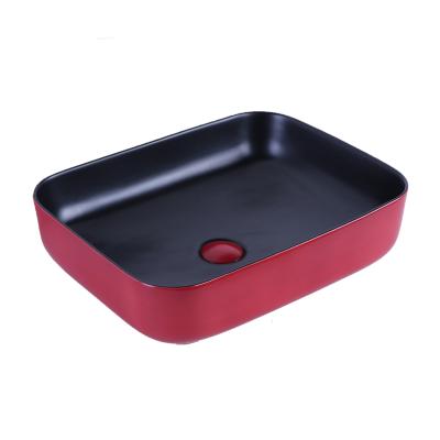 China Matt Color Easy Clean Rectangular Ceramic Lavatory Art Luxury Bathroom Sinks The Lavatory Price for sale