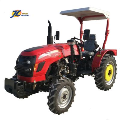 China Construction material shops W 35hp 40hp 4 x 4 compact tractor with front loader and backhoe mini tractor with front loader and mower made in china by Jiulin for sale