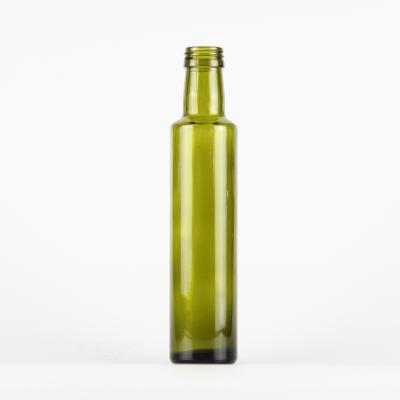 China High Quality Antique Green Glass Body Oil Hot Sale Round Beverage Bottle for sale