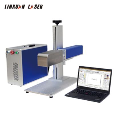 China Laser Marking 20W 30W Raycus Fiber Laser Cattle Ear Tag Printing Machinery Laser Logo Printing Machine for sale