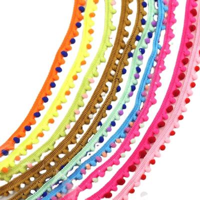 China Durable Colorful Mini Pom Pom Trims Small Nylon Band Ball Trims For Kid's Garment DIY Furniture Craft Accessories for sale