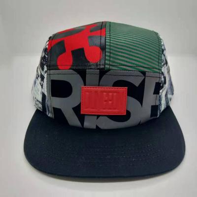 China Full Character Printing Flat Brim 5 Panel Cap With Leather Patch for sale