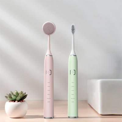 China 2 In 1 Rechargeable Sonic Electric Wireless Charging Toothbrush And Face Cleaner Soft Hair For Adult 1200mAh for sale