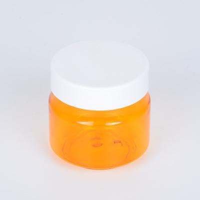 China Skin Care Cream Factory Supply Empty Plastic Orange Cosmetic 250ml Body Scrub Cream Jar for sale