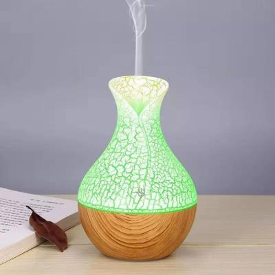 China 2021 Hotel Essential Selling Diffuser Humidifier To Home Appliances 130ML USB Wooden Car Design Vase for sale