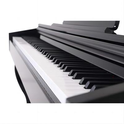 China Piano digital vertical personalizado Con teclas ponderadas Piano eléctrico negro en venta