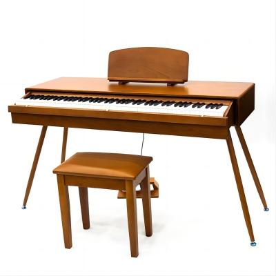 China Piano eléctrico vertical marrón de 15 V Piano eléctrico para mujeres en venta