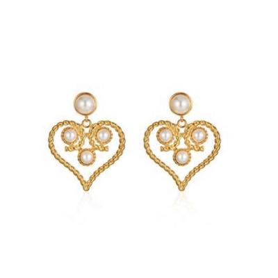 China Retro FASHIONABLE European and American exaggerated love pearl earrings female hollowed personality atmosphere earrings plated with 18K for sale