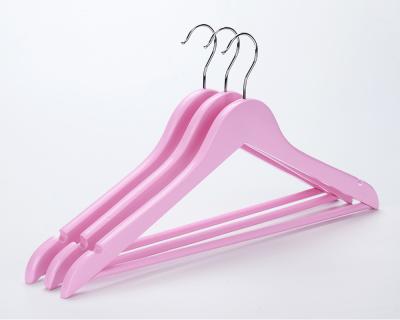 China Wavy Shape Pink Wooden Hanger With Cheap Round Bar Hanger for sale