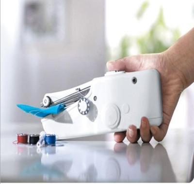 China Cordless Mini Hand Sewing Machine Home Use Electric Sewing Clothes Fabrics Sewing Machine for sale