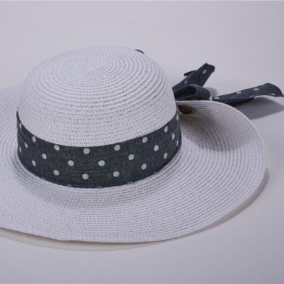 China Nice Folded Dobby Shape Big Brim Summer Beach Fashion Lady Style Straw Hat With Big Bowknot for sale