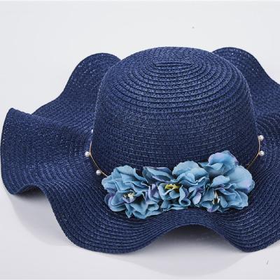 China Beautiful Nice Dobby Flower Decoration Wave Shape Summer Beach Fashion Lady Style Straw Hat for sale