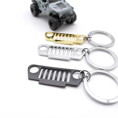 China Global High Quality Car Grille Gold Metal Car Key Ring Pendant Gift Chained Silvery Black Pattern for sale