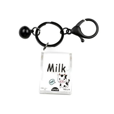 China Creative Global Cow Milk Drink Acrylic Key Chain Moving Liquid Key Chains Drift Bottle Jewelry Gift for sale