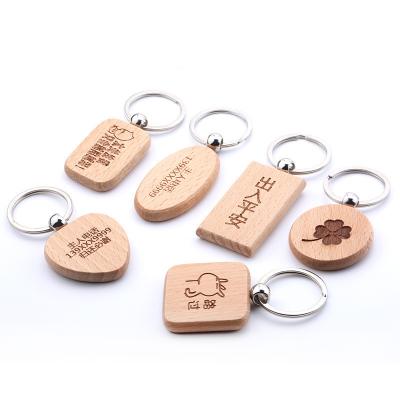 China Global Custom Wooden Key Chain Blank Laser Lettering Beech Key Chain Graduation Memorial Gift for sale