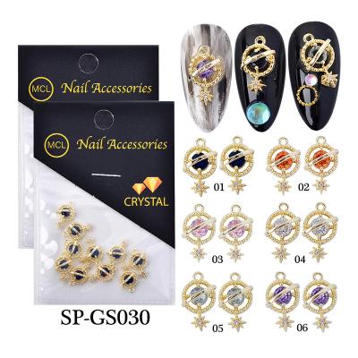 China Nail Art Beauty New 3D Planet Dangle Zircon Nail Charm Gold Metal Rhinestones Crystal Jewelry For Nail Art for sale