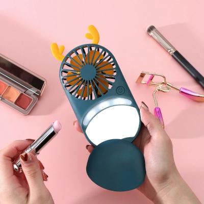 China First-class shine two mini fan ladies hand usb makeup mirror beauty fan quiet portable pocket rechargeable dual-use portable fan for sale