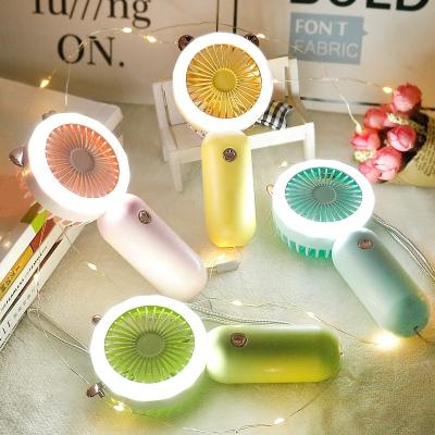 China USB Rechargeable Mini Cartoon Fan Mini Student Fan Quiet Handheld Portable Silent Light LED Small Fan for sale