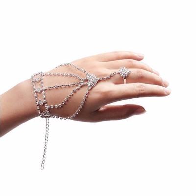 China New Arrival CLASSIC Rhinestone Ring With Chain Adjustable Chain Crystal Finger Bracelet for sale