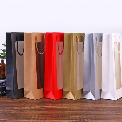 China Recycled Materials DIY Craft Paper Bag Good Quality Wine Bag With Window for sale