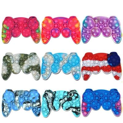 China Eco-friendly Material Amazon New Gamepad Stir Sensory Toys Push Noise Stirrer Toy Doll Wiggle Person Toy for sale