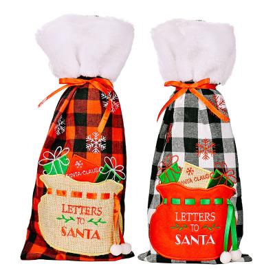 China 2021 Christmas Recyclable Wine Bottle Cover Plaid Wine Bag Christmas Red Black Letters Santa Christmas Wine Covers Xmas Decor Navidad for sale