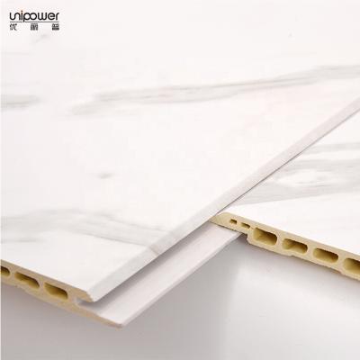 China Custom Printed Waterproof+ECO-Friendly Unipower Pattern Shop Fitting Decorative PVC Caladding Interlocking Wall For Bathrooms And Kitchens for sale