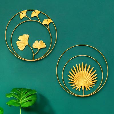 China Nordic minimalist light luxury gold round ginkgo leaf metal home background wall decoration for sale