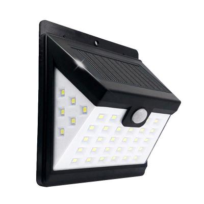 China Motion-activated40 Garden Lights LED Human Body Waterproof Solar Three-way Induction Wall Light for sale