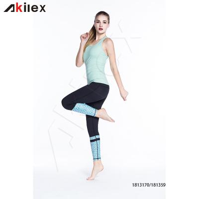 China Breathable Akilex Custom Womens Hallow Back Cut And Sew Tank Top For Gym Sports for sale