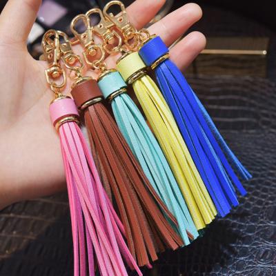 China PU Leather Tassel Fringe Bag Lobstel Key Chain Tassel Garment Accessories Key Chain Decorative Wholesale Popular Pendant Tassel for sale