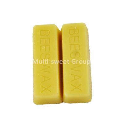 China Food Pharmacy Cosmetics Natural Organic Beeswax Lip Balm Yellow Beeswax for sale