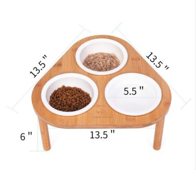 China Sustainable Bamboo Elevated Bamboo Stand with 3 Ceramic Bowls Pet Bowl for Cats and Dogs Wheels with Stand Feeder, for sale